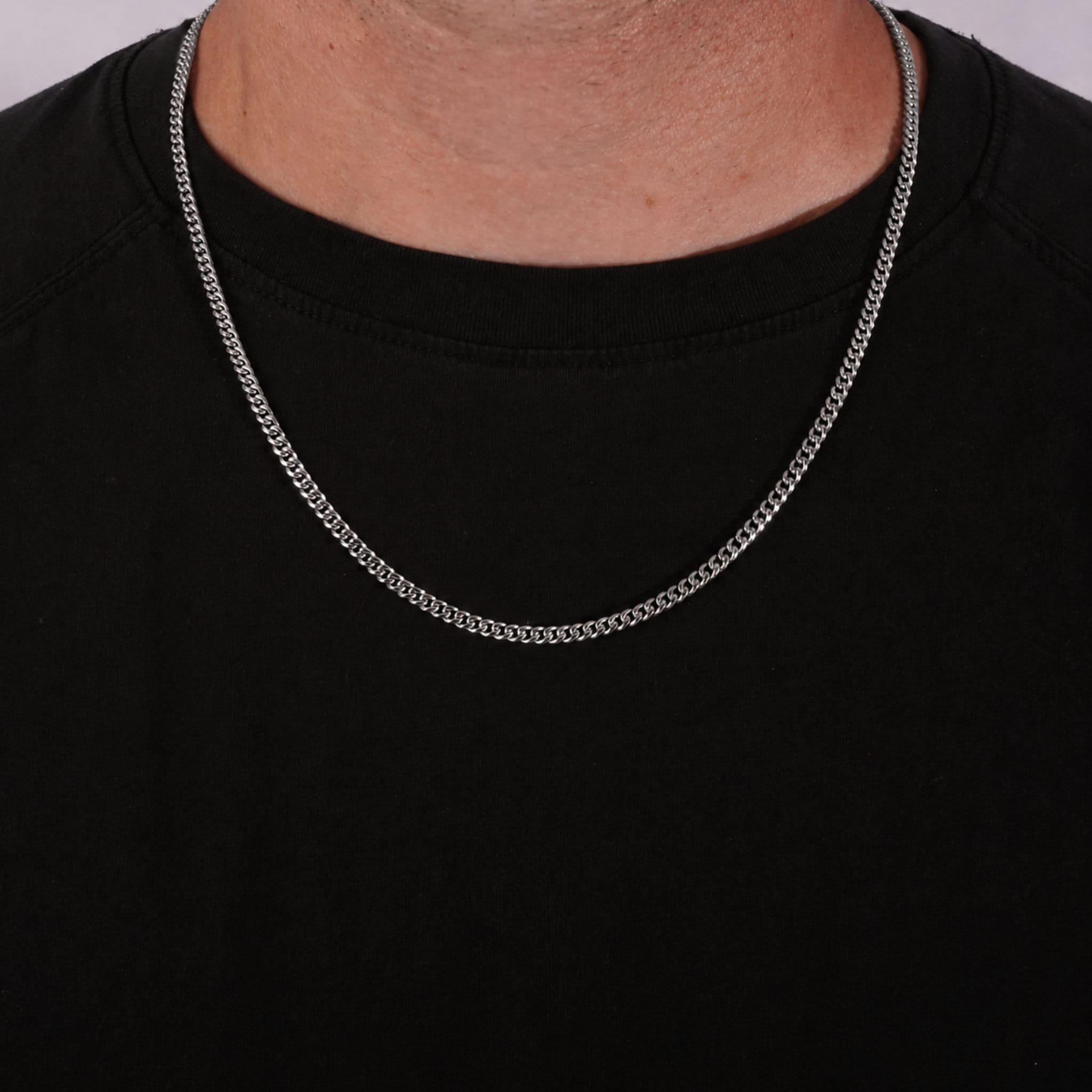 3.5mm cuban link necklace on model wearing a black shirt