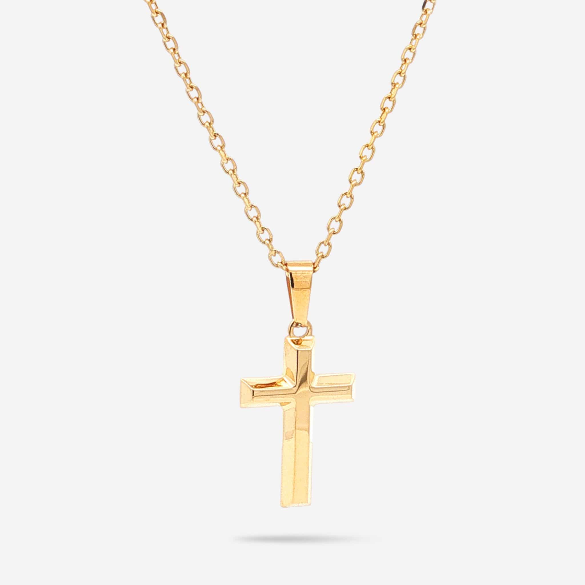 A polished yellow gold cross pendant necklace on a matching cable chain, shown against a light gray background.