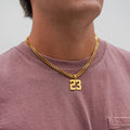 Gold cuban chain with number 23 pendant