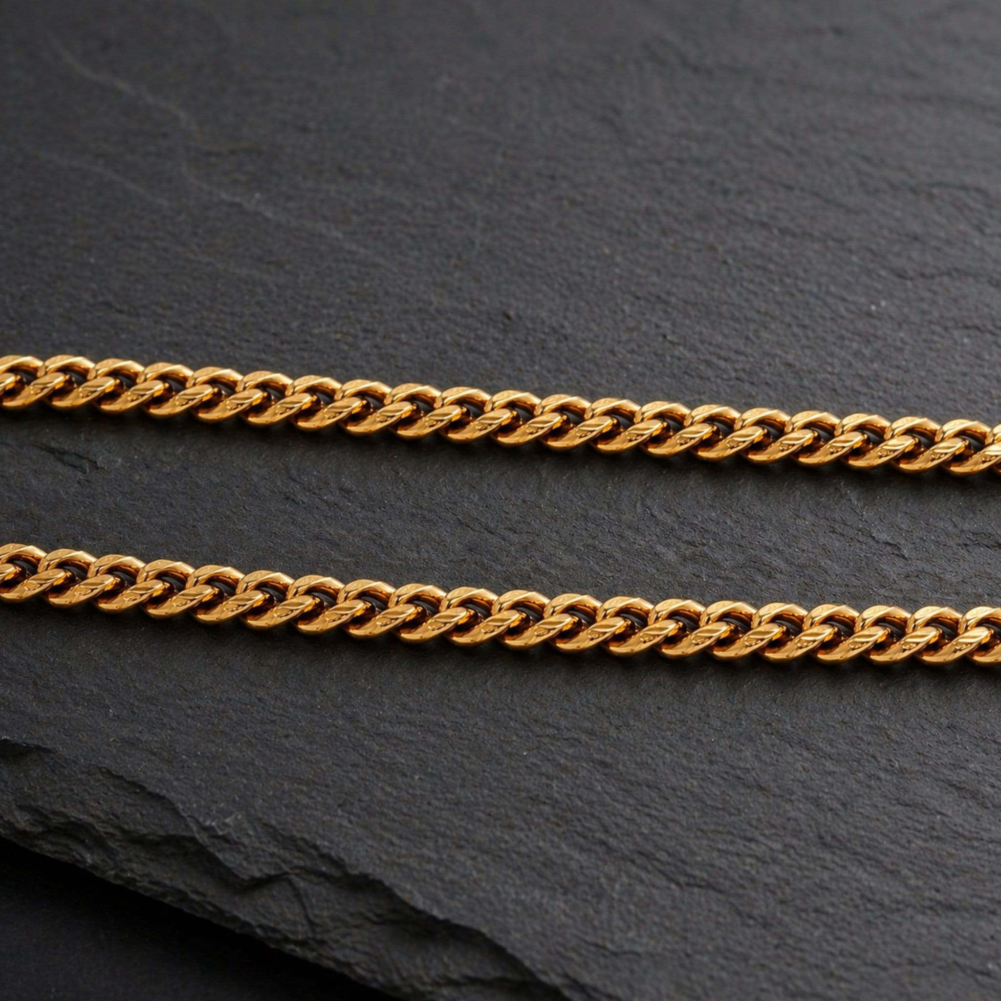 cuban chain link necklace on black background