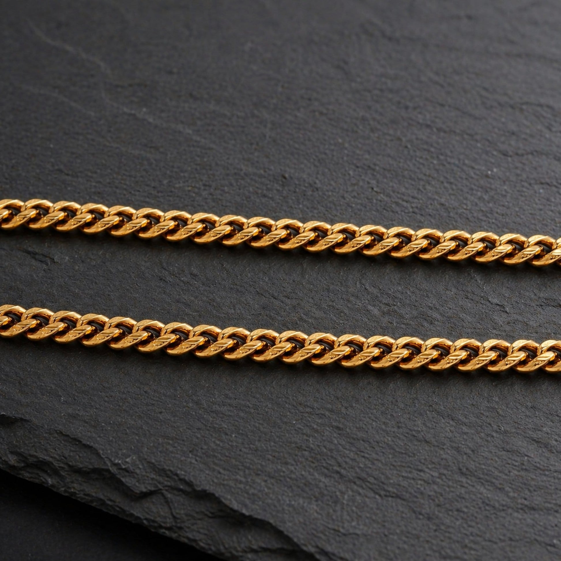cuban chain link necklace on black background