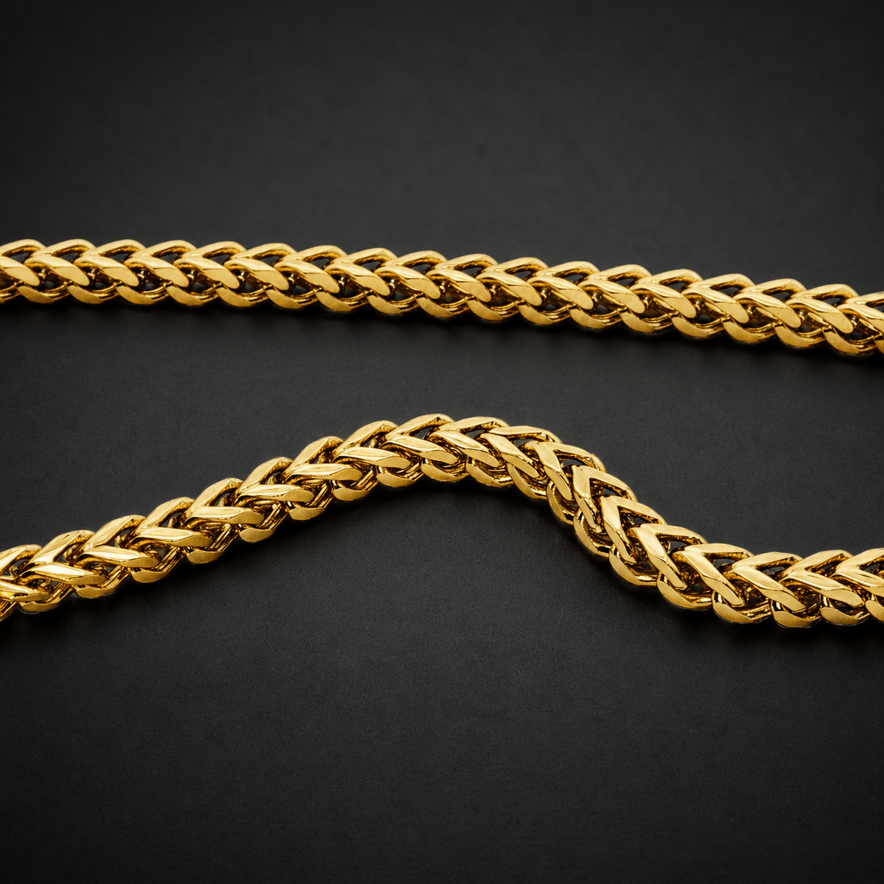 Gold franco chain on a black background
