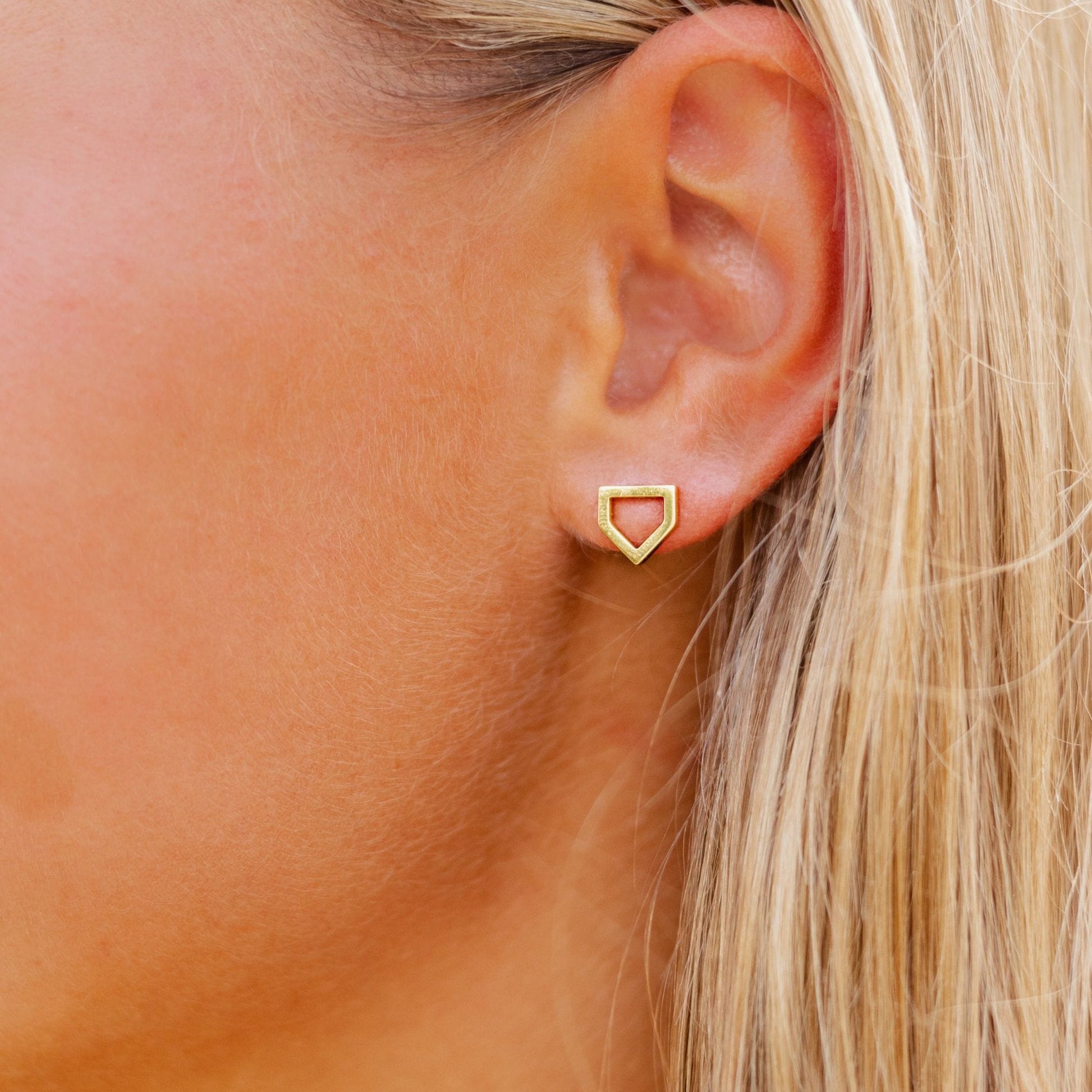closeup of home plate earrings