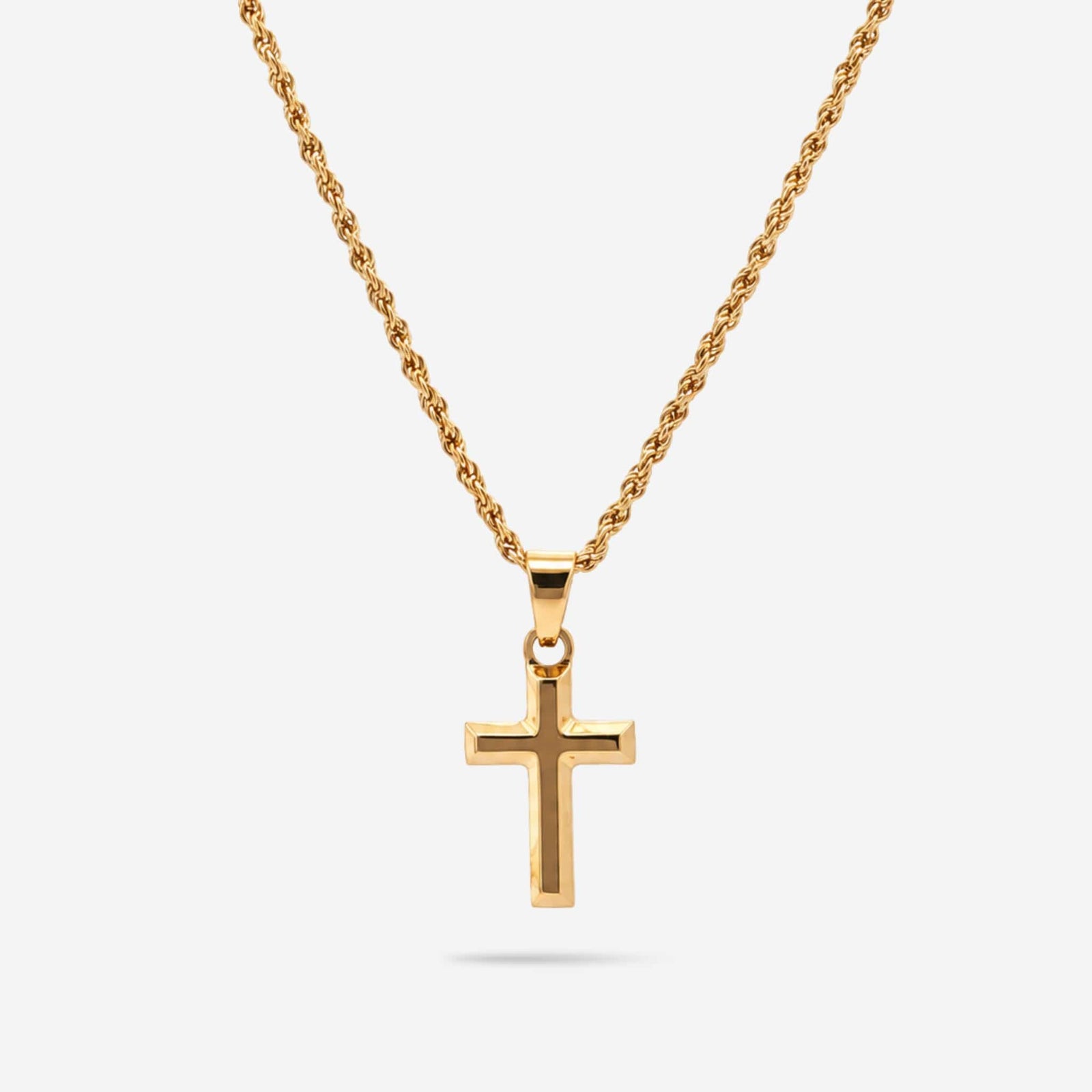 A polished yellow gold cross pendant necklace on a matching gold chain, shown against a light gray background.